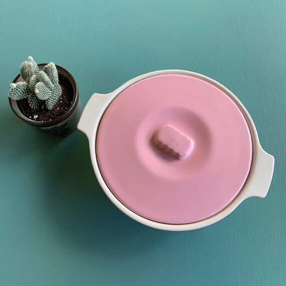 pink casserole dish with lid
