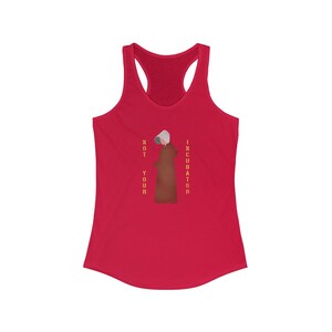 May include: Red tank top with a white and brown illustration of a woman wearing a white bonnet and a brown robe. The text "NOT YOUR INCUBATOR" is printed in yellow on the tank top.