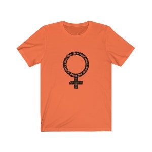May include: Orange short-sleeved t-shirt with a black graphic of a female symbol with the text "Roe. Roe. Roe your boat. Gently down the stream."