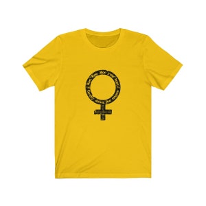 May include: Yellow short-sleeved t-shirt with a black graphic of a female symbol with the text "Roe. Roe. Roe your boat Gently down the stream" around the circle.