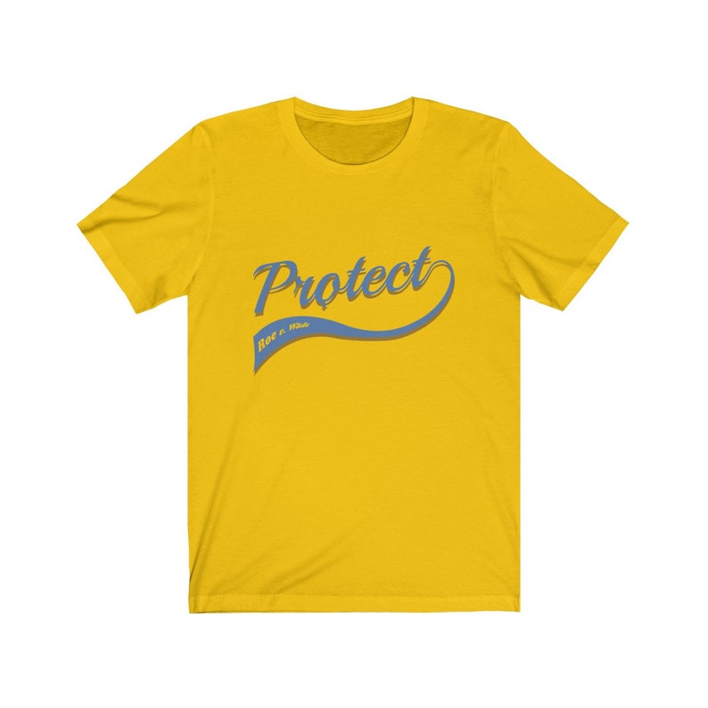 May include: Yellow short-sleeved t-shirt with a blue and white graphic that says "Protect Race & Hate".