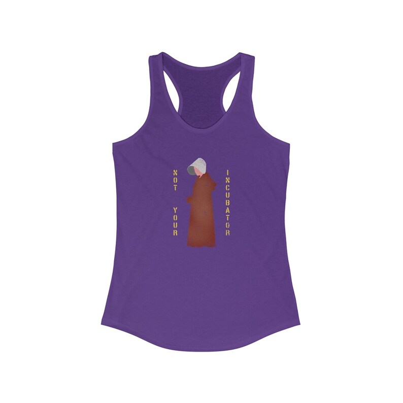 May include: Purple tank top with a graphic of a woman in a brown robe and white bonnet. The text "NOT YOUR INCUBATOR" is printed vertically on either side of the woman.