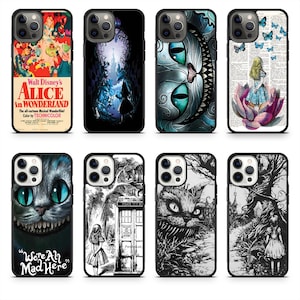 May include: A collection of phone cases featuring designs inspired by "Alice in Wonderland." The cases showcase colorful movie posters, illustrations of the Cheshire Cat, and scenes from the story. The cases are black with various graphic designs.