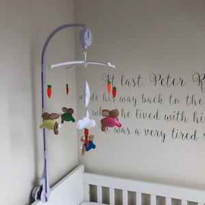 Handmade peter rabbit theme mobile with musical arm