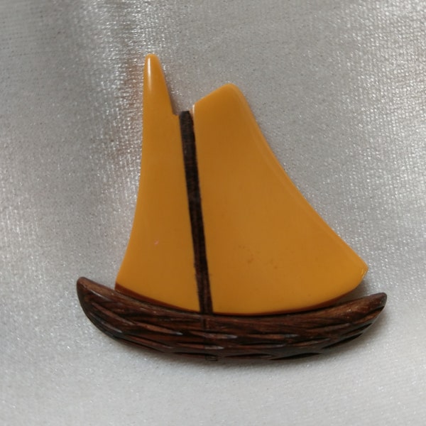 Vintage Early 20th Century Butterscotch Bakelite and Carved Wood Sailboat Brooch