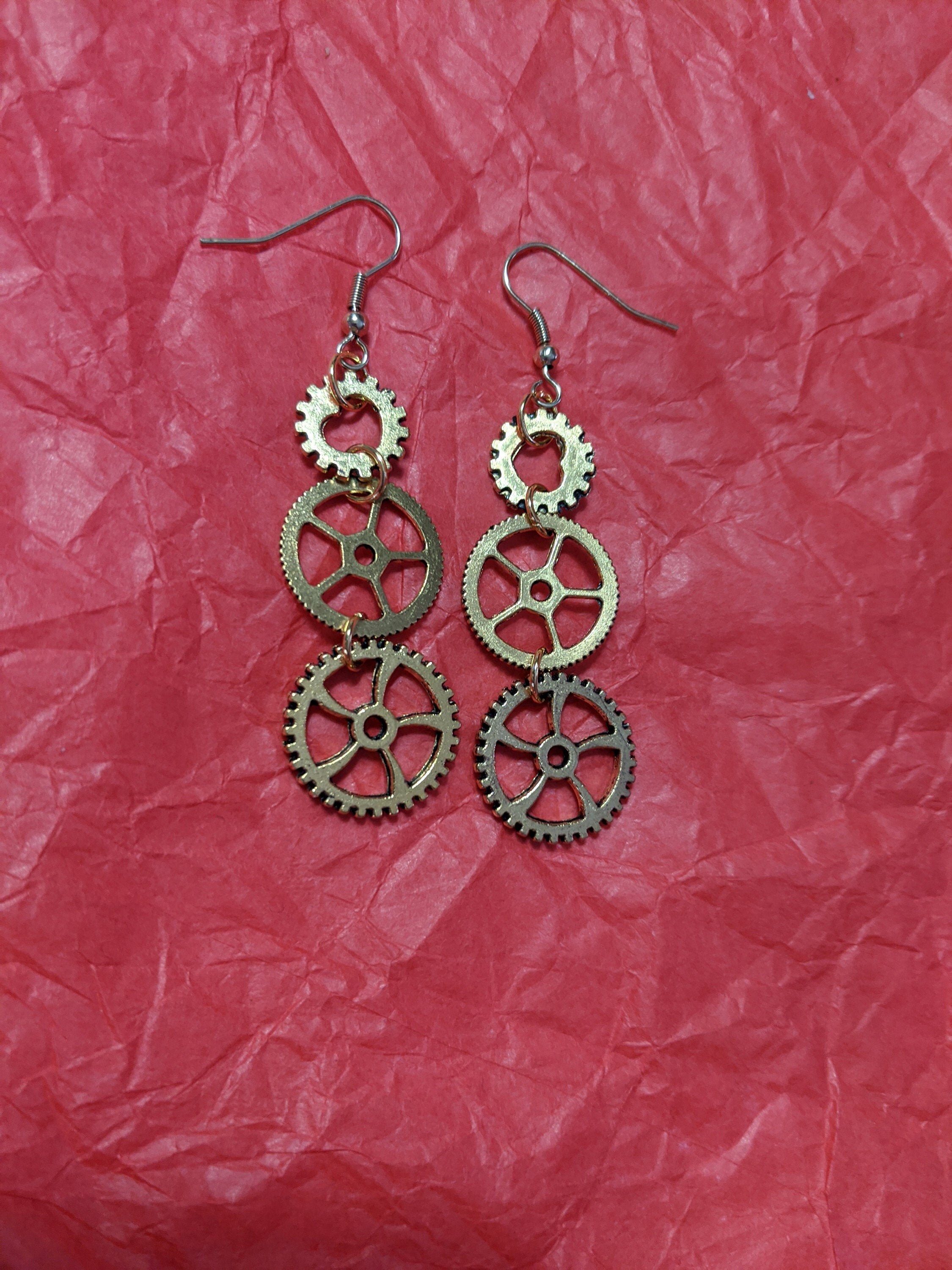 Gold Tone Orion Original Gear Love Dangle Pierced Earrings