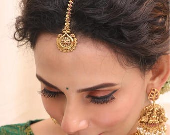 Tarinika Antique Gold Plated Leafy Maangtika with Peacock Design - Indian Mang Tika for Women Perfect for Ethnic Occasions | nethi chutti
