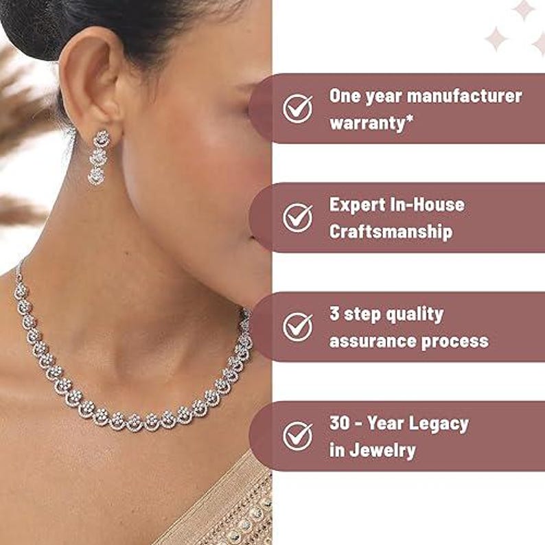 May include: A woman wearing a silver necklace and earrings. The image includes text highlighting a one-year manufacturer warranty, expert in-house craftsmanship, a three-step quality assurance process, and a 30-year legacy in jewelry.