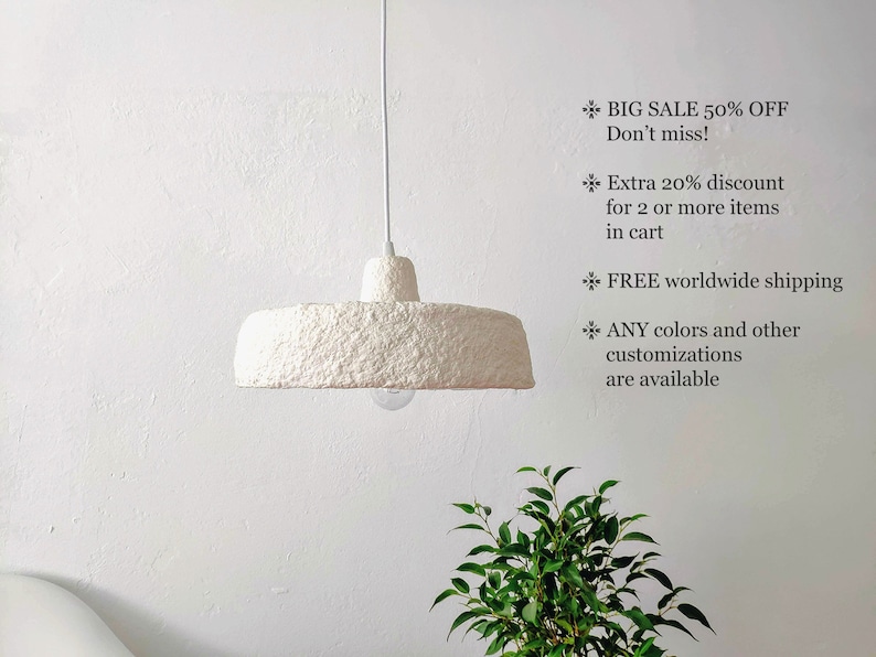 May include: White paper pendant light fixture with a textured surface. The light is hanging from a white cord. The image includes text: "BIG SALE 50% OFF Don't miss! Extra 20% discount for 2 or more items in cart FREE worldwide shipping ANY colors and other customizations are available"