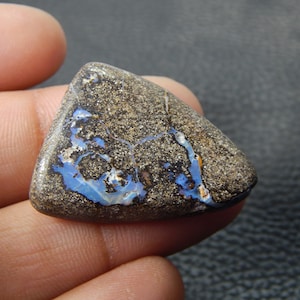 62-karaats kei opaal fijn glad cabochon mooie vorm 25 x 33 x 10 mm
