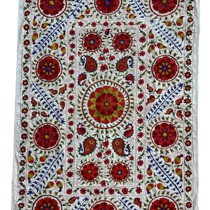 Vintage Suzani Silk Embroidered bed cover and wall hanging.