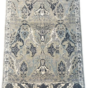 Oriental Hand knotted wool area rug.