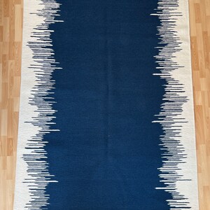 Sumak Modern Hand woven Wool Rug.
