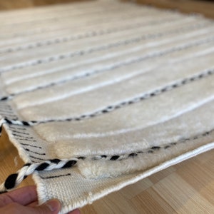Moroccan Berber hand knotted wool rug.