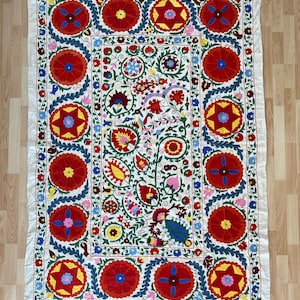 Suzani Silk Embroidered bed cover and wall hanging.