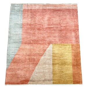 Contemporary design hand made woolen rug. 300x256cm.