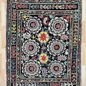 Silk Suzani Embroidered bed cover and wall hanging.