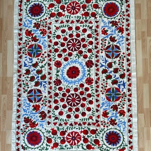 Suzani Silk Embroidered bed cover and wall hanging.