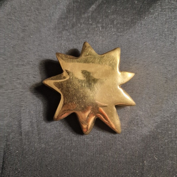 Vintage Christian Lacroix brooch in gold metal