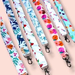 Wrist strap, neck strap and badge holder. carabiner key ring personal care accessories. Nurse, doctor, medical secretary