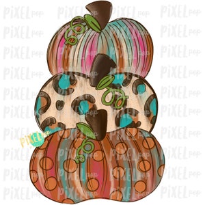 May include: A stack of three pumpkins with different patterns. The top pumpkin is a light blue, pink, and brown striped pattern. The middle pumpkin is a beige, brown, and blue leopard print. The bottom pumpkin is a brown, orange, and blue polka dot pattern.
