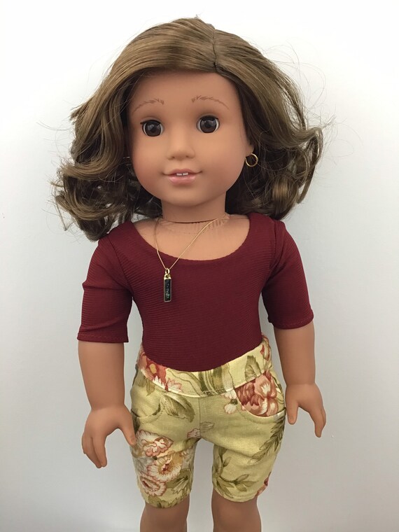 american girl doll with curly brown hair