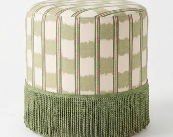Custom upholstered Round Swivel Ottoman: Custom Upholstery with bullion fringe trim-swivel ottoman ikat fabric bullion trim- ikat ottoman.