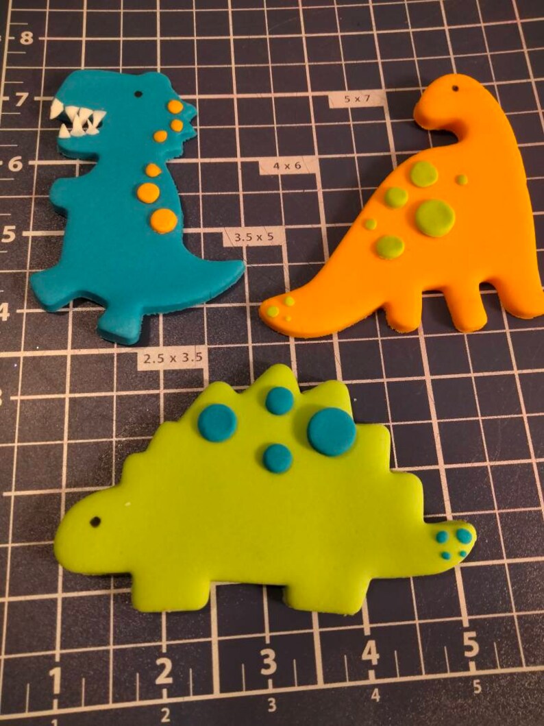 Set of 3 plus number for age. Dinosaur edible cake toppers