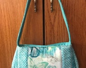 Quilted panel shoulder bag