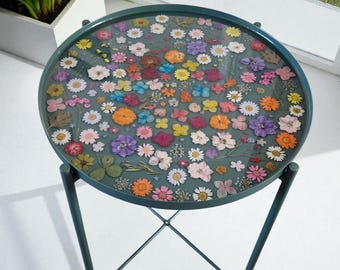Hand made resin filled table. With with real dried flowers.