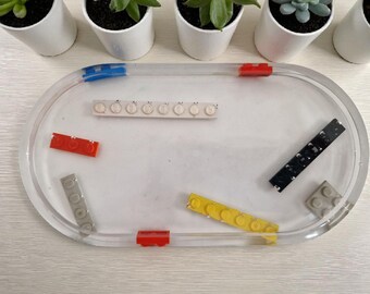 Tray for trinkets, change and/jewellery. Can also be used for food. Hand made.