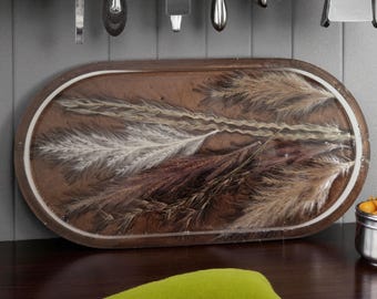 Tray for trinkets, change and/jewellery. Can also be used for food. Hand made.