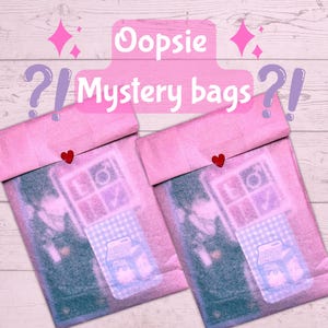 May include: Two pink paper packages labelled "Oopsie Mystery bags" with question marks. Each package is sealed with a small red heart sticker. The packages contain a blue and white checkered pattern with a milk carton graphic.