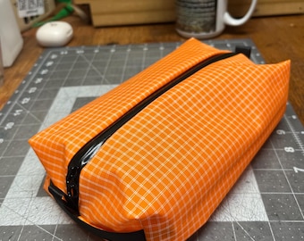 Box bag packing cube in tangerine size medium made from ultra grid