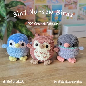 May include: Three crocheted bird figures: a blue penguin, a pink owl, and a gray bird. The text "3in1 No-sew Birds" and "PDF Crochet Pattern" are visible. The phrase "digital product" and the seller's username are also displayed.