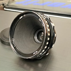 Lente de cinema grande angular Zebra MIR-11 12,5 mm f/2.2 vintage soviética (KMZ) da URSS