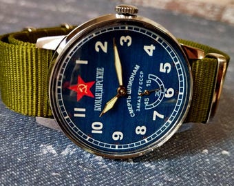 Commander's watch in military style POBEDA Men's vintage wrist watch