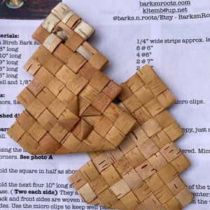 May include: Two unfinished birch bark baskets, woven in a square pattern. The baskets are made with 1/4 inch wide strips of birch bark, approximately 15, 20, and 18 cm long. The text on the page reads: "Barks & Roots Basket, Karen L. Tembreull, 203 North Birch Street, L'Anse, Michigan 49946, barksnroots.com, kltemb@up.net, @barks.n.roots/Etsy - BarksnRo, 1/4" wide strips approx. le, 8 @ 6", 4 @ 8", 2 @ 7", 2, Micro clips."