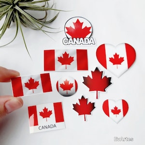 May include: A set of Canadian flag stickers in various shapes and sizes, including a heart, a circle, a leaf, and a rectangle. The stickers are printed with the Canadian flag, featuring a red maple leaf on a white background with red stripes on the sides. The stickers are ideal for adding a touch of Canadian pride to any surface.