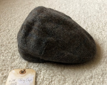 May include: A wool ivy cap in blue, brown, and gray weave. The tag reads "Wool Ivy Cap 100% Blue/Brown Grey Weave Made in USA #20"
