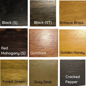 May include: Nine wood stain color samples, including Black (S), Black (ST), Antique Brass, Red Mahogany (S), Gunstock, Golden Honey, Forest Green, Grey Seas, and Cracked Pepper.