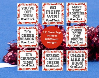 May include: Eight 2.5 inch cheer tags with red and white snowflake designs. The tags have motivational cheer slogans like "Go Fight Win!" and "It's Cheer Season!"
