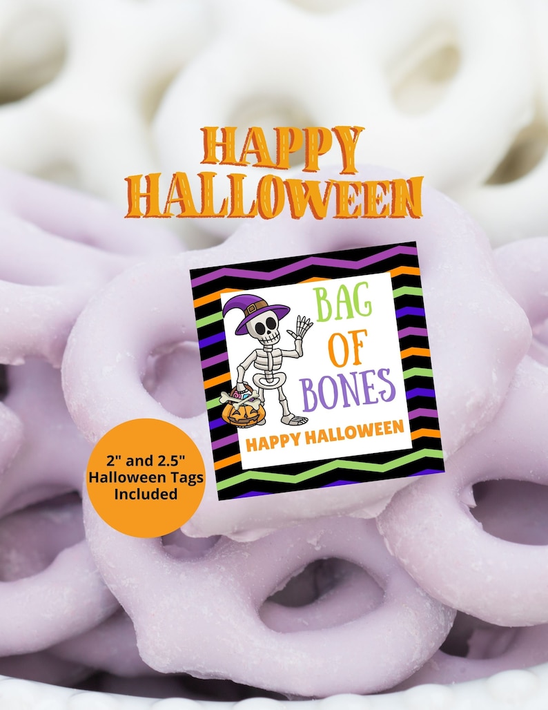 May include: A square Halloween tag featuring a skeleton wearing a purple hat and holding a pumpkin bucket. The text reads BAG OF BONES and HAPPY HALLOWEEN. The border has black, purple, orange, and green zig-zag lines. 2 inch and 2.5 inch tags included.