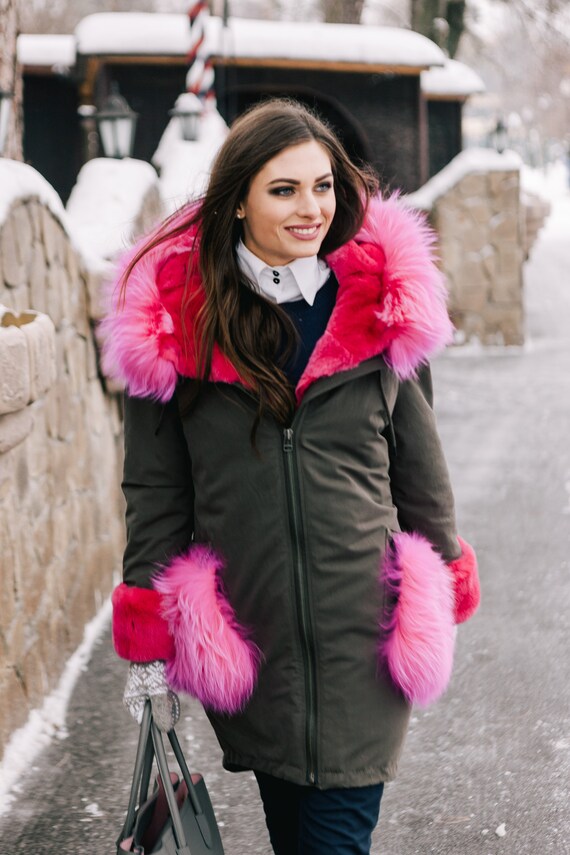 khaki parka with pink fur hood