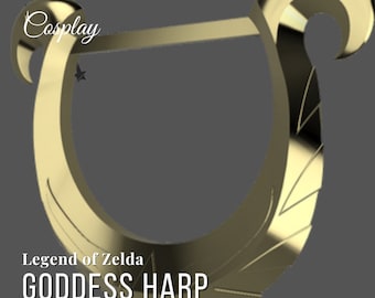 May include: A gold-coloured 3D model of the Goddess Harp from The Legend of Zelda video game series. The harp is a crescent shape with intricate details and a smooth, metallic finish.