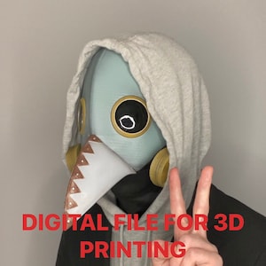 May include: A person wearing a grey hoodie and a black jacket is holding up two fingers in a peace sign. They are wearing a blue and brown plague doctor mask. The text "DIGITAL FILE FOR 3D PRINTING" is written in red letters. The text "IG @ben_and_stuff TikTok @ben_and_stuffo2" is written in white letters.