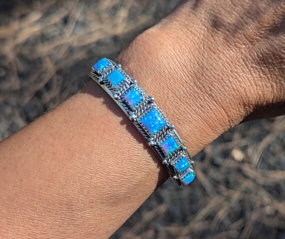 Owhee blue opal- silver braid bracelet