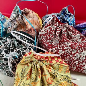 Colorful reusable drawstring bags, Perfect for small gifts, Zero waste gift wrap alternative, Eco-friendly pouchs, Unique color combinations