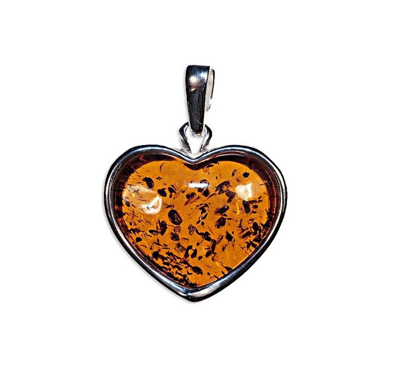 Amber pendant and silver heart