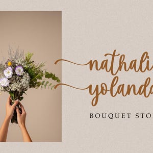 May include: A bouquet of white and purple flowers with green leaves, held by hands. The text "nathalie yolanda BOUQUET STORE" is written in brown cursive script.